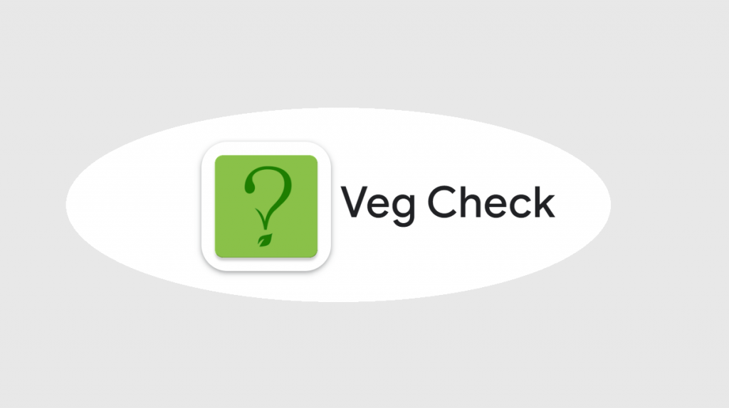 Logotipo Veg Check dentro de círculo oval com fundo cinza claro.