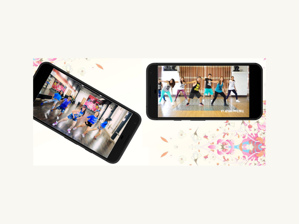 Dois celulares mostrando videoaulas do Aplicativo Treino Aeróbico para Zumba, cada uma com um grupo de pessoas dançando Zumba