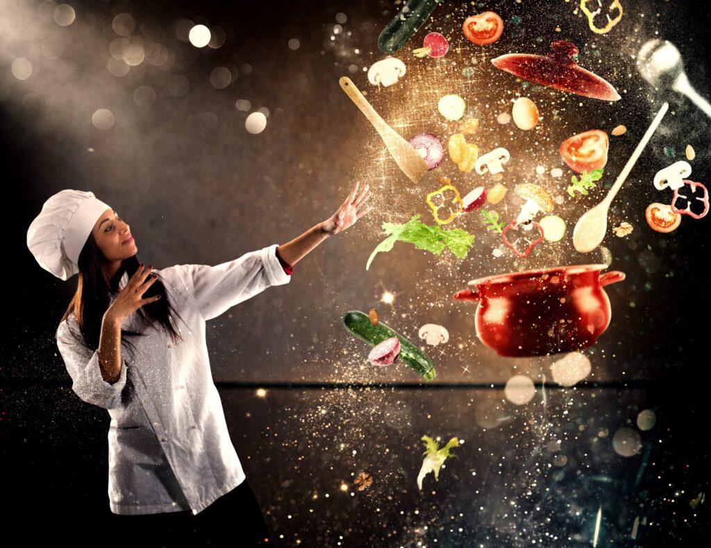 Chef de cozinha mulher apontando para panela e ingredientes voando
