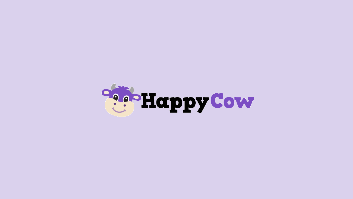 Logotipo Happy Cow em fundo lilás