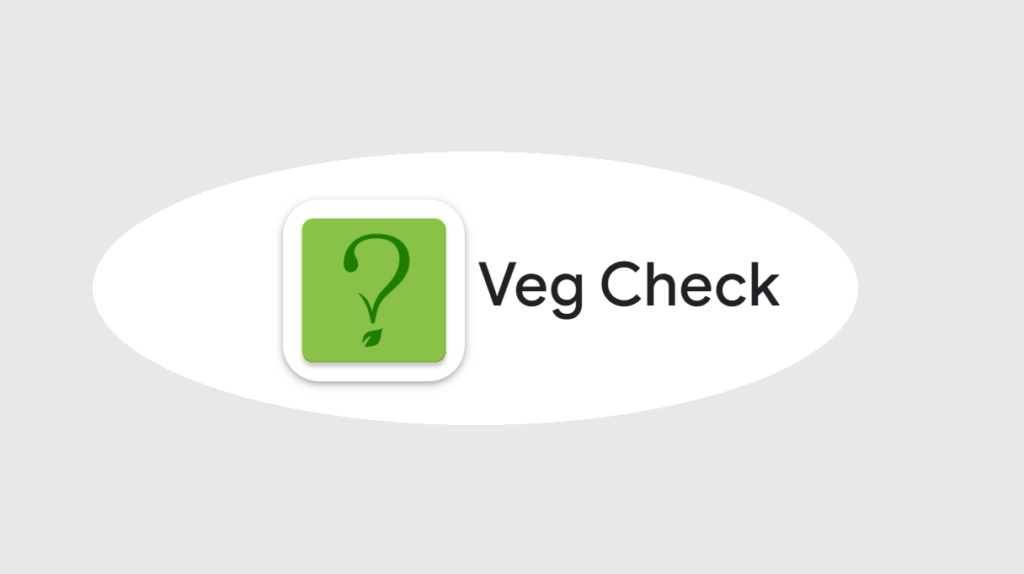Logotipo Veg Check dentro de círculo oval com fundo cinza claro.